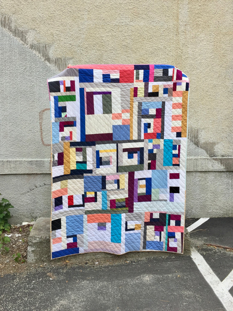 solid improv throw quilt