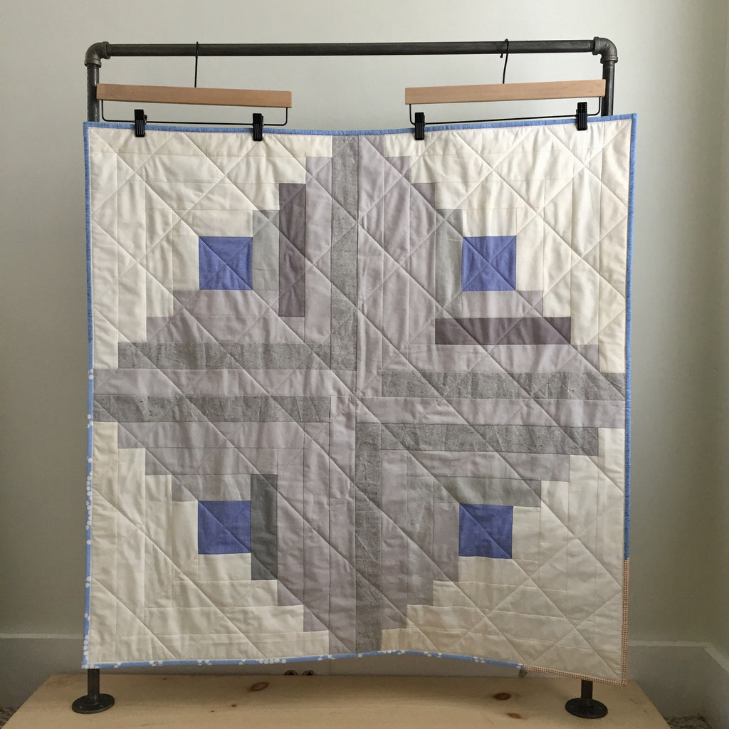 neutral log cabin baby quilt