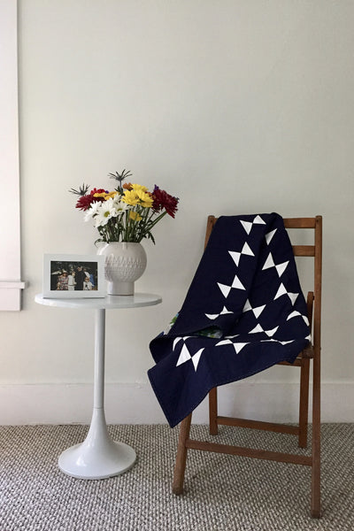 Navy-and-White Amish Hourglass Baby Quilt