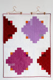 Red-and-Purple Log Cabin Throw Quilt
