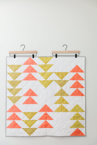 Pink-and-Yellow Flying Geese Baby Quilt